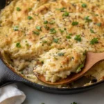 Plated french onion chicken and rice recipe dish.